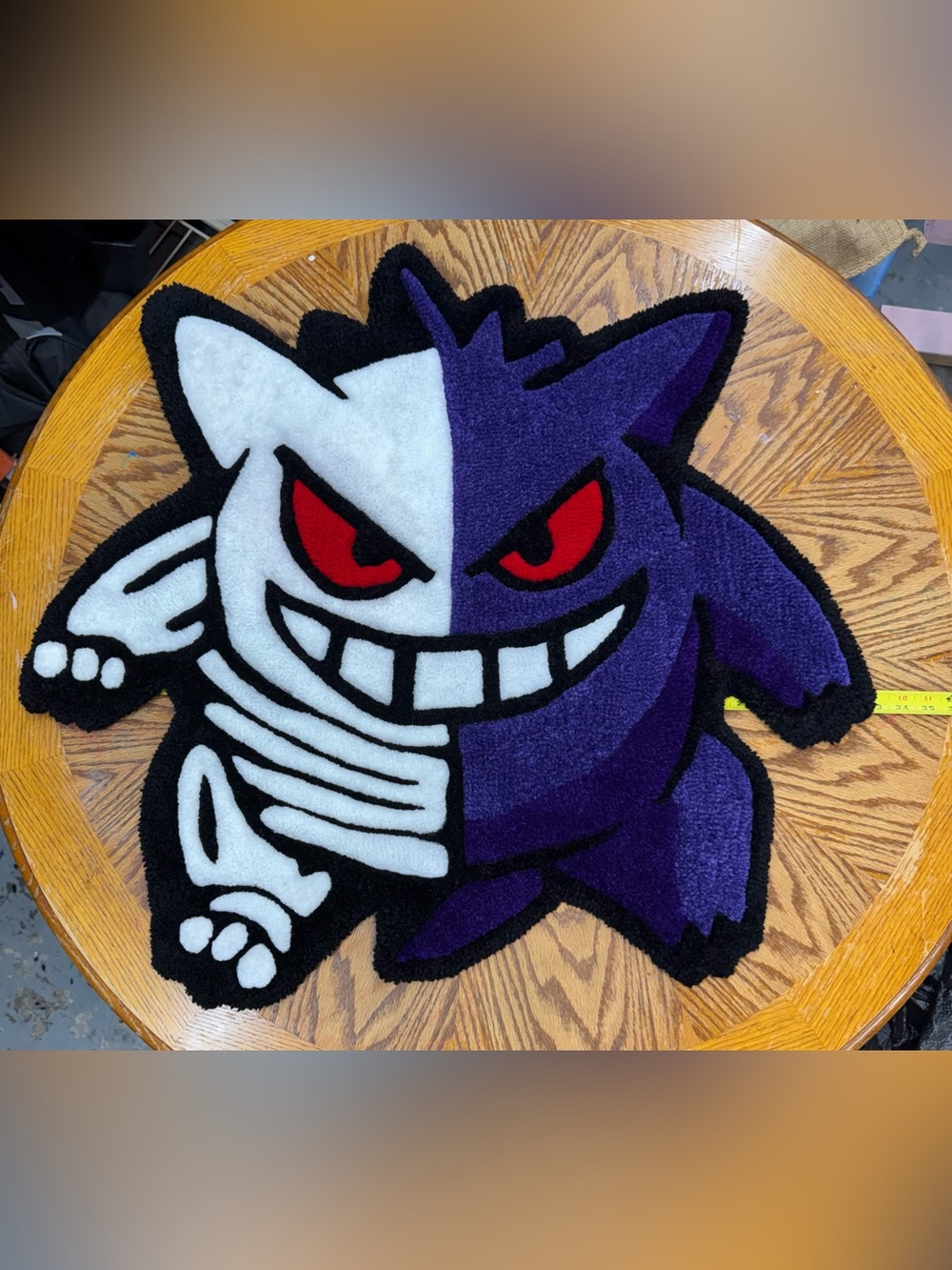This rug is a handmade representation of Gengar from Pokémon 33”x31”